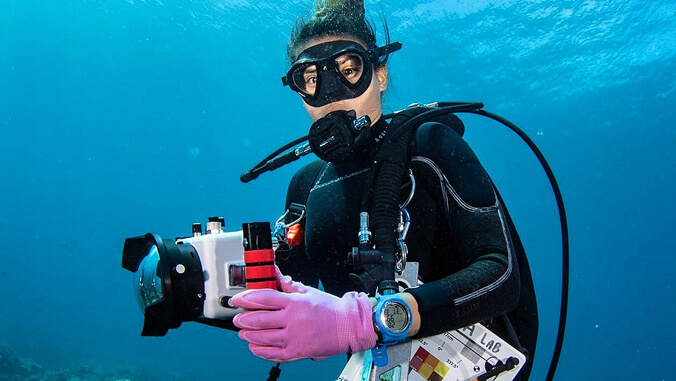 diver with camera underwater